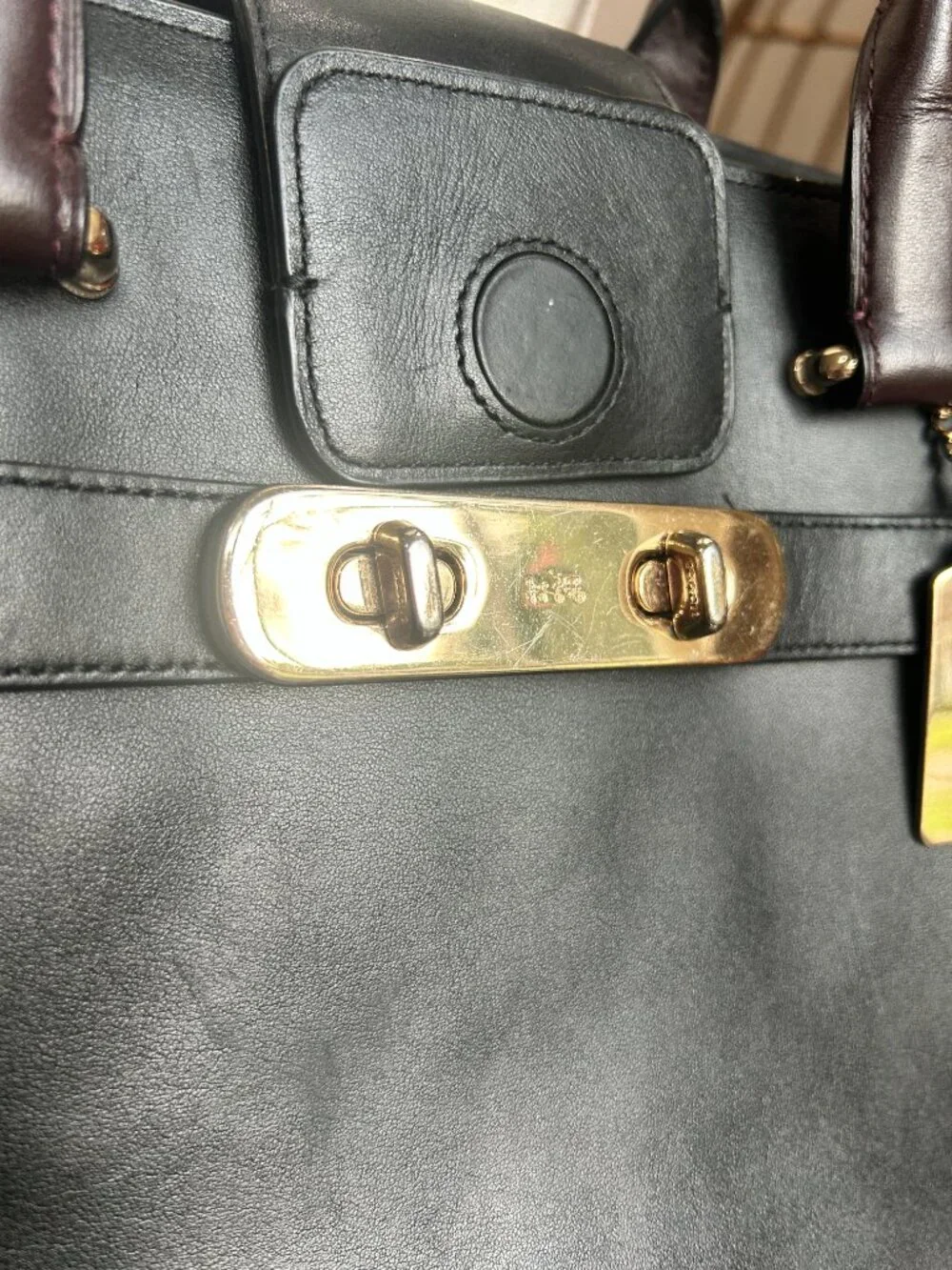 Coach Swagger Carryall in black leather with snakeskin-embossed side panel